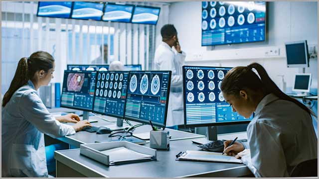 Monitor systems showing CT and MRI scans